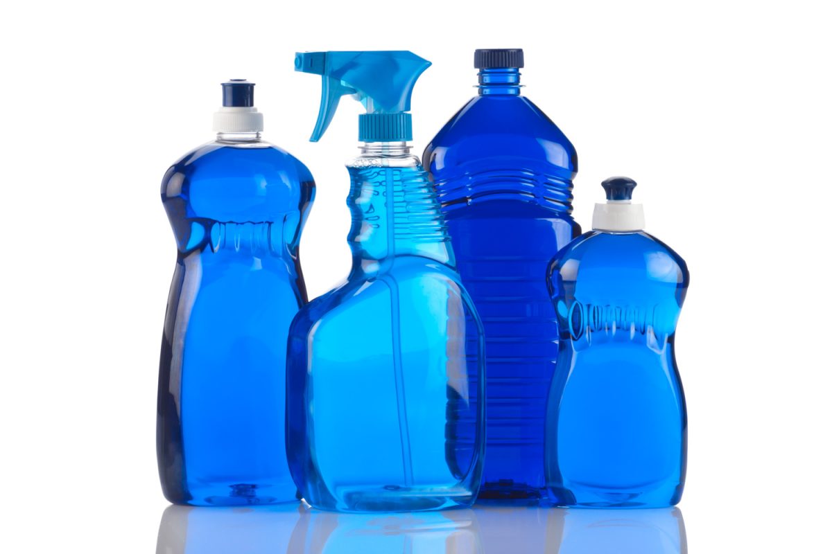 Bottles of blue cleaning products 