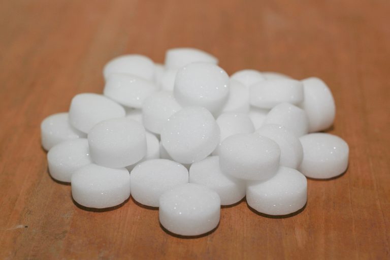 Mothballs with wood background. Camphor - Do Mothballs Evaporate Or Dissolve Over Time